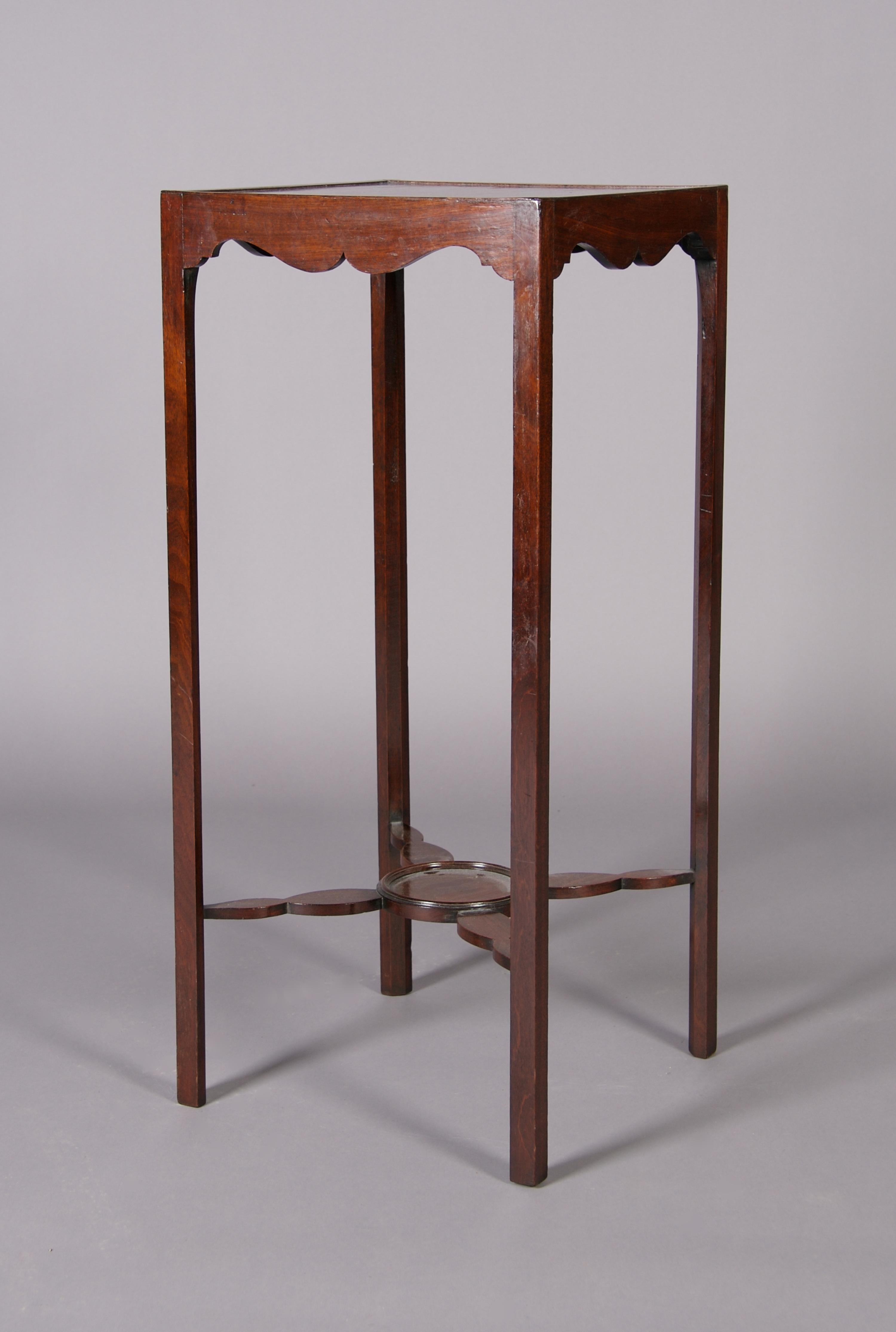 An English Mahogany Urn Stand, Height 31 3/4 x width 14 x depth 14 inches.
