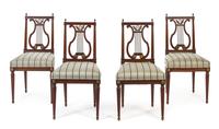 A Set of Four Louis XVI Style Brass Mounted Mahogany Lyre Back Chairs Height 36 3/4 inches.