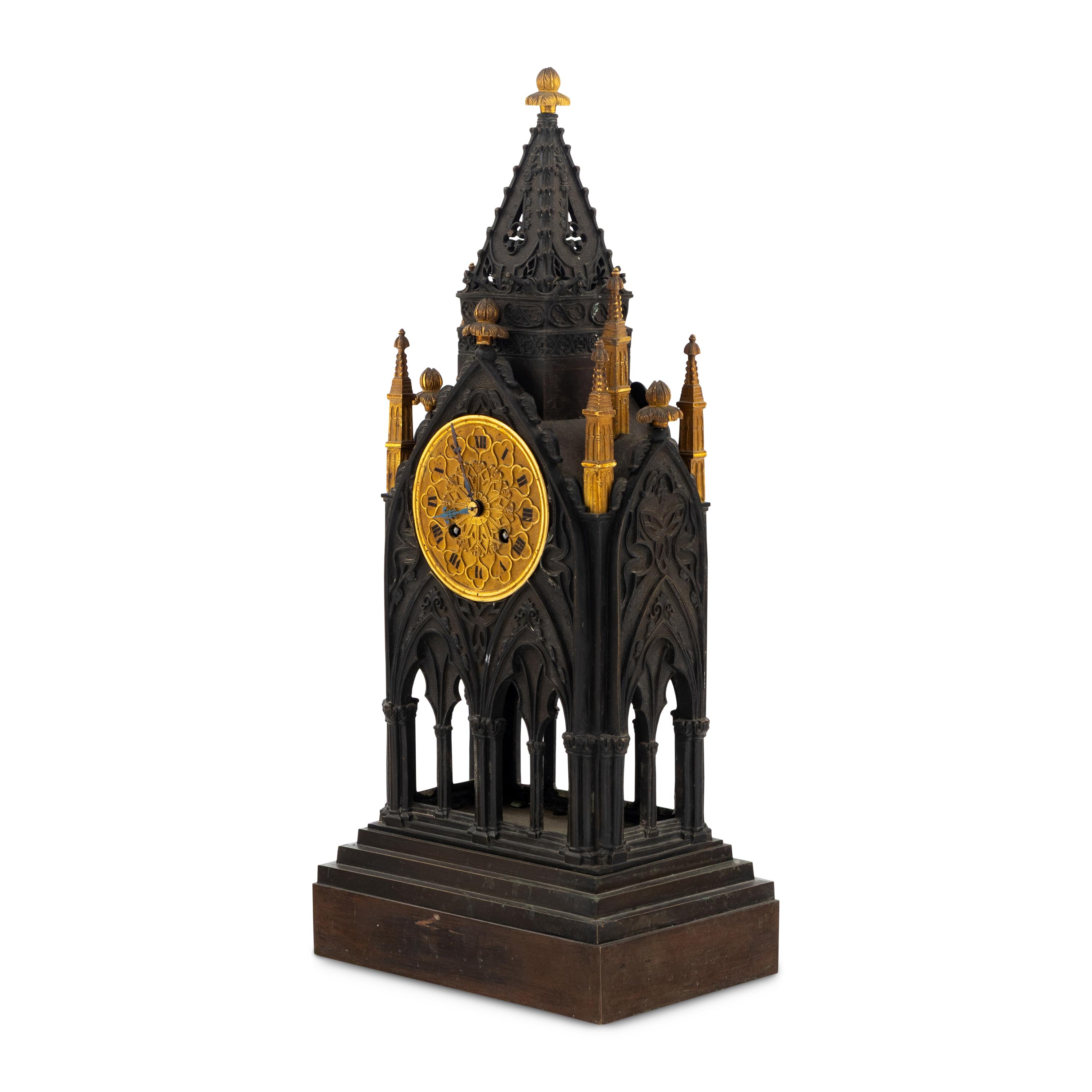 A French Patinated and Parcel Gilt Bronze Cathedral-Form Clock