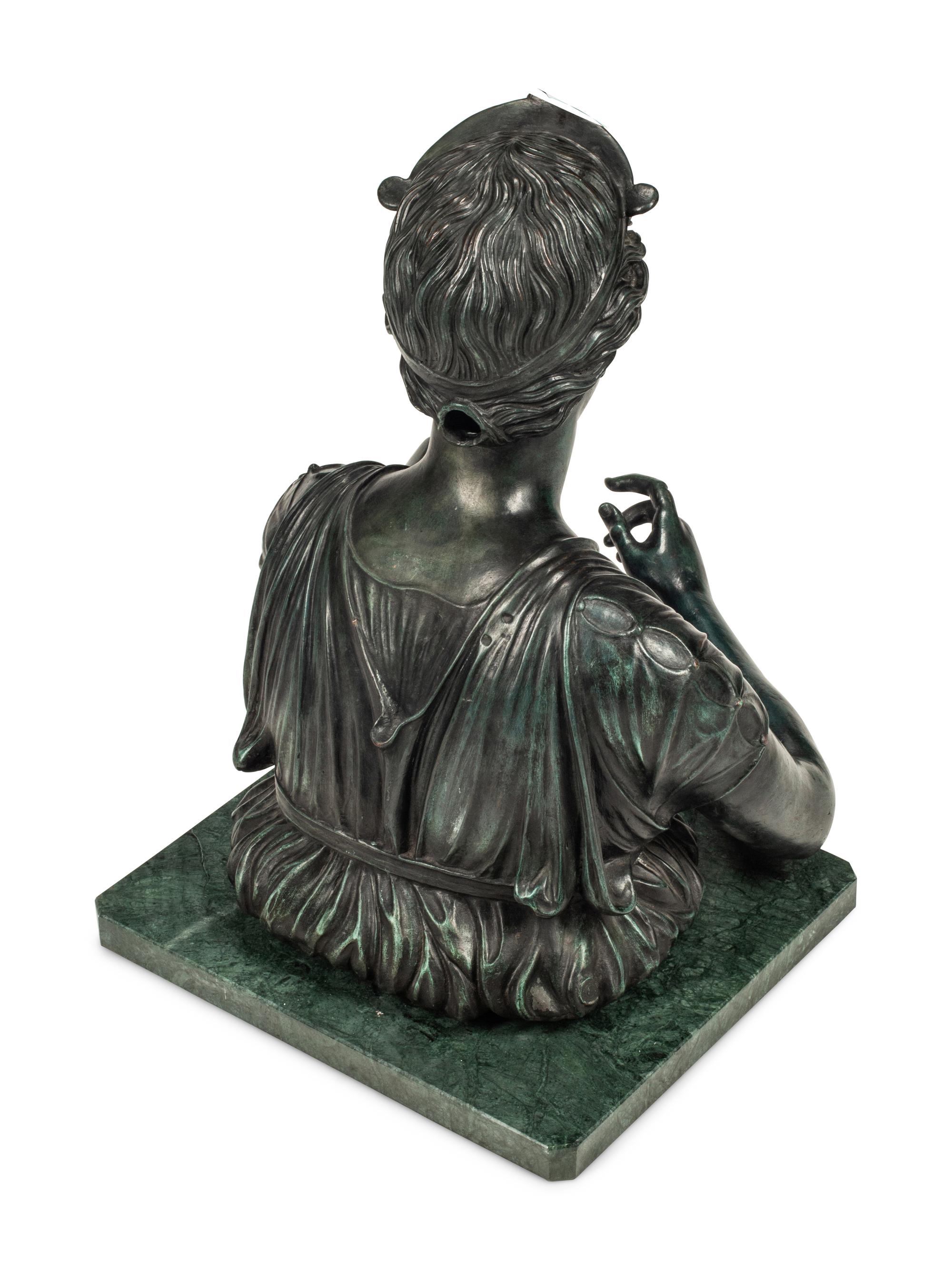 A Patinated Bronze Bust of a Woman