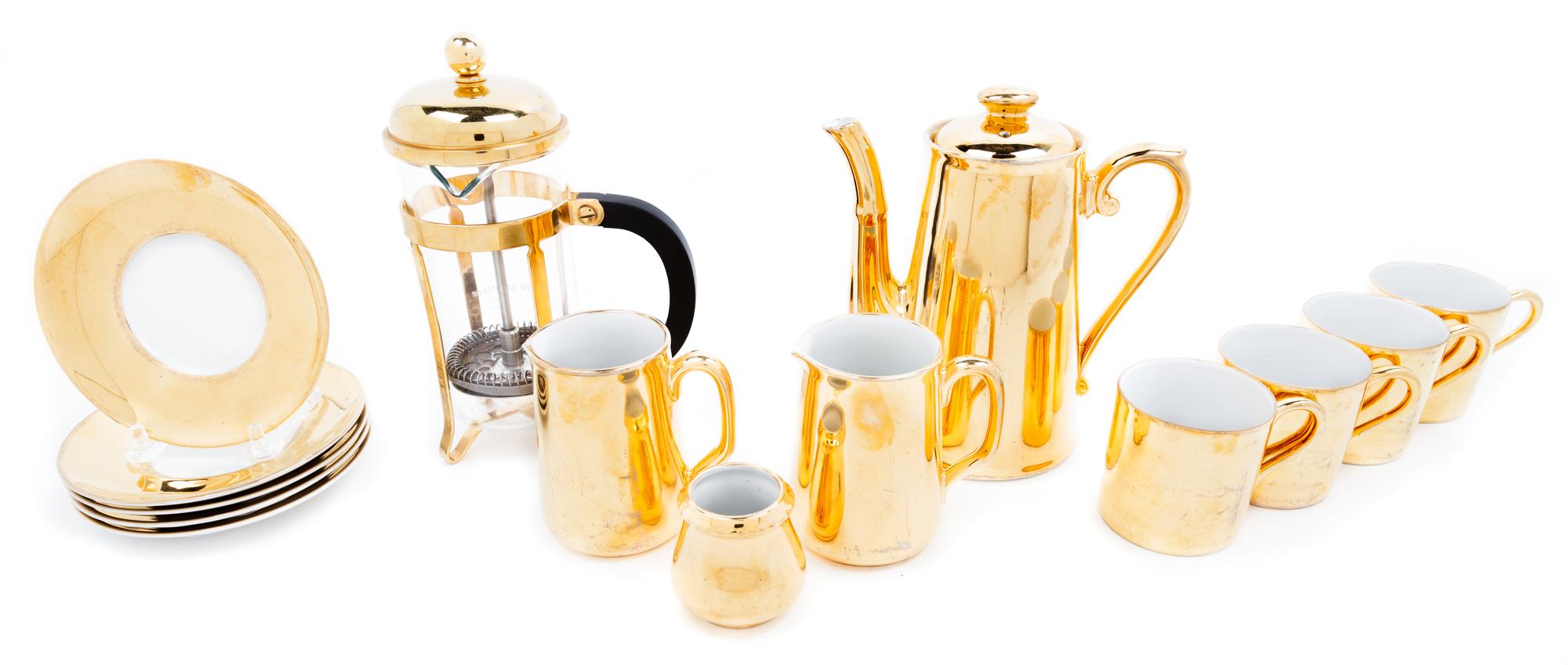 A Royal Worcester Porcelain Tea and Coffee Set Height of press 8 1/2 inches.