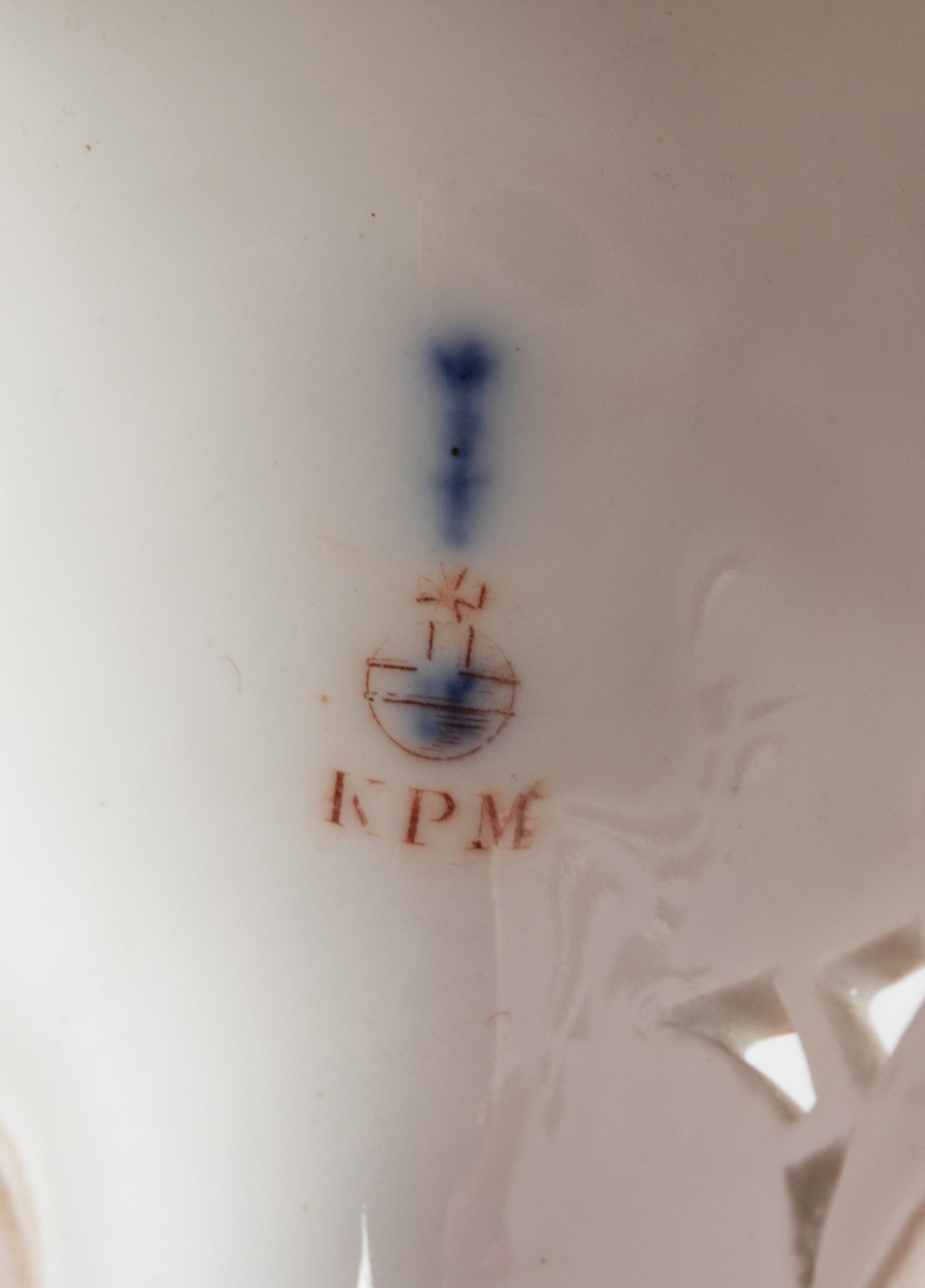 Two Berlin (K.P.M.) Painted and Parcel Gilt Porcelain Wall Brackets