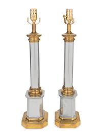 A Pair of Brass and Steel Columnar Lamps