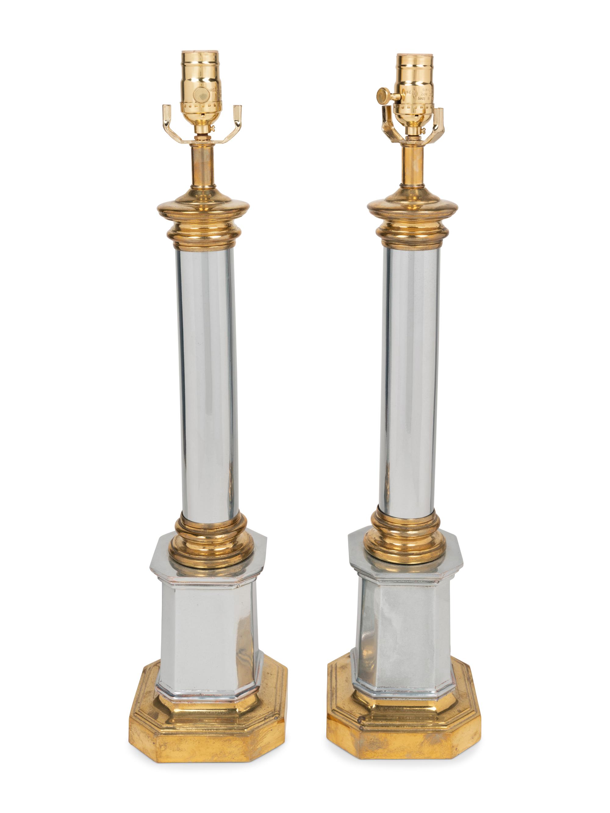 A Pair of Brass and Steel Columnar Lamps