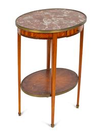 A Louis XVI Two-Tier Marble Inset Top Gilt Metal Mounted Oval Marquetry Side Table — 19TH CENTURY