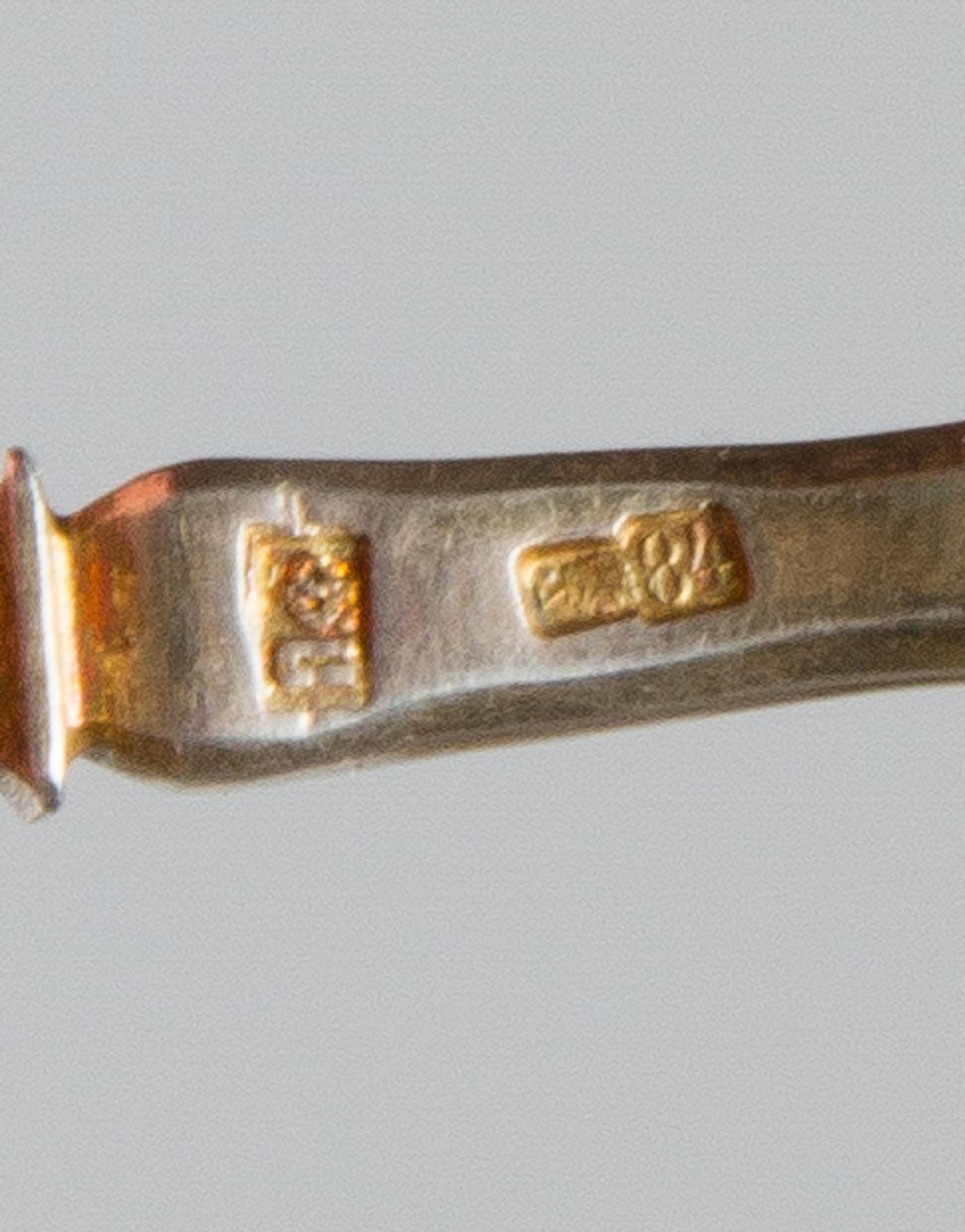 A Russian Silver-Gilt and Enamel Spoon, Maker's mark likely Pitor Fariseyev, Moscow, early 20th century, having an enamel and twist dec