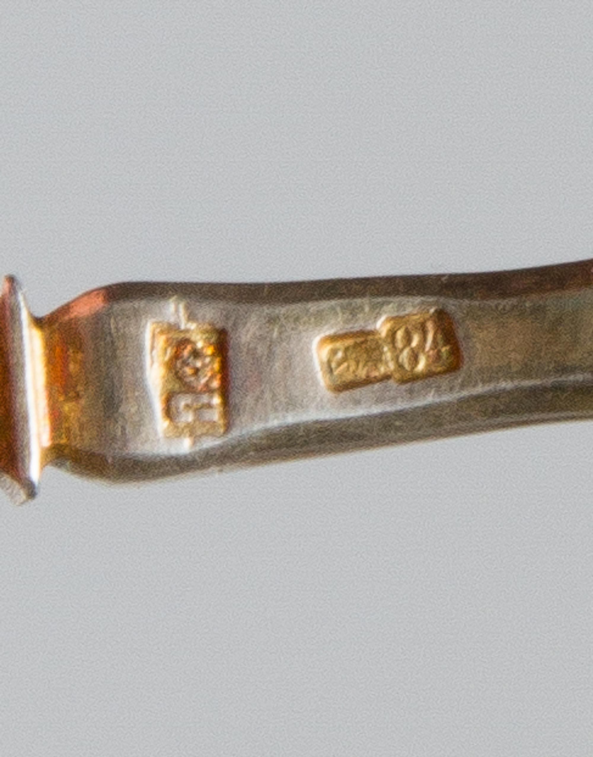 A Russian Silver-Gilt and Enamel Spoon, Maker's mark likely Pitor Fariseyev, Moscow, early 20th century, having an enamel and twist dec