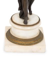 A Pair of French Empire Style Gilt and Patinated Bronze Figural Four-Light Candelabra