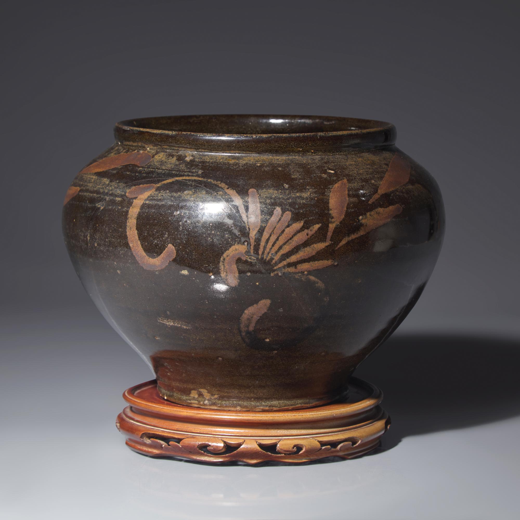 A Chinese Black Glazed Wide-Mouthed 'Guan' Jar, Jin/Yuan Dynasty or Later — 金/元或更晚 黑釉花卉紋敞口罐