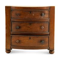 A Regency Mahogany Diminutive Bowfront Chest of Drawers