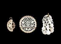 Three Reticulated Jade Pendants