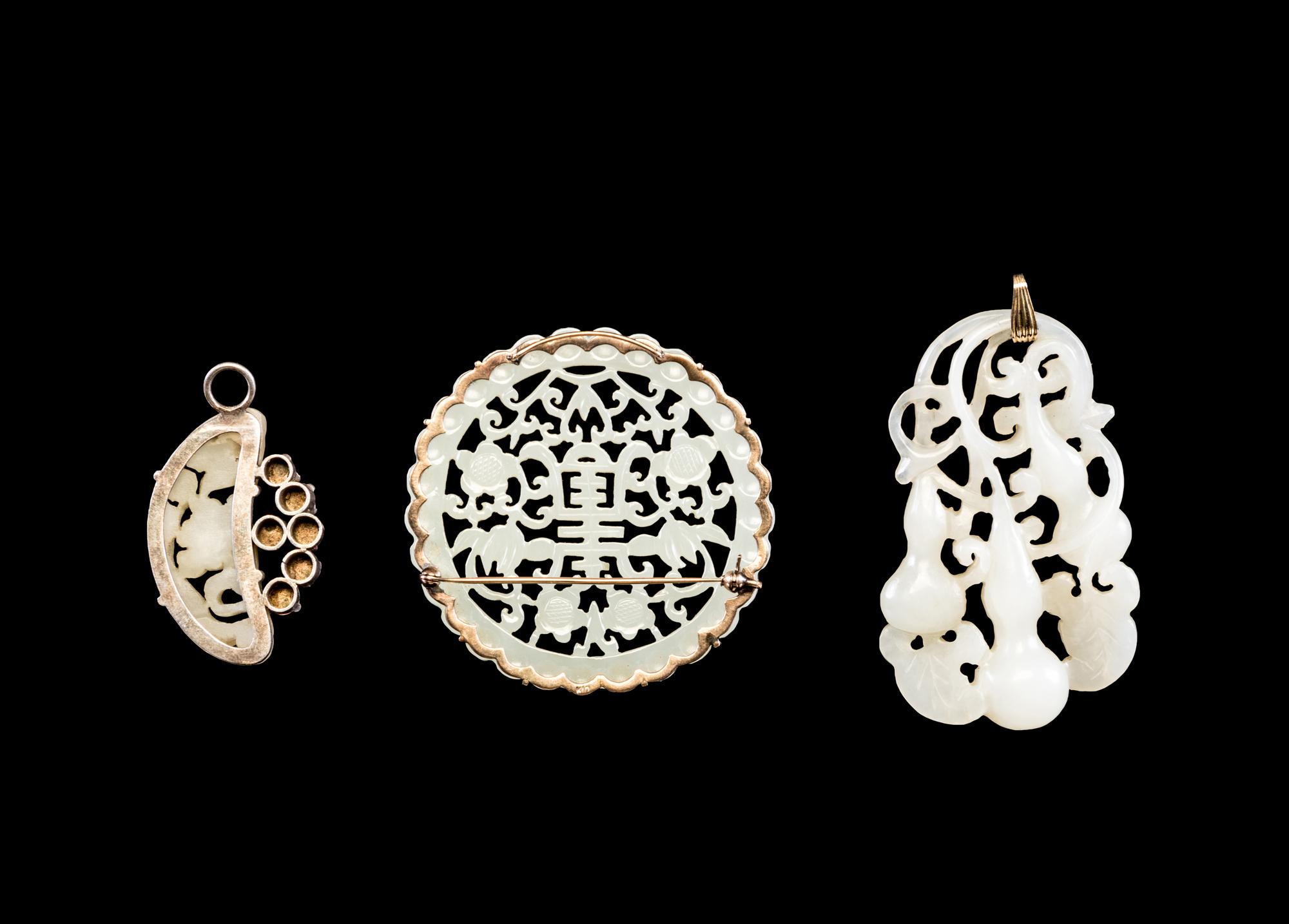 Three Reticulated Jade Pendants