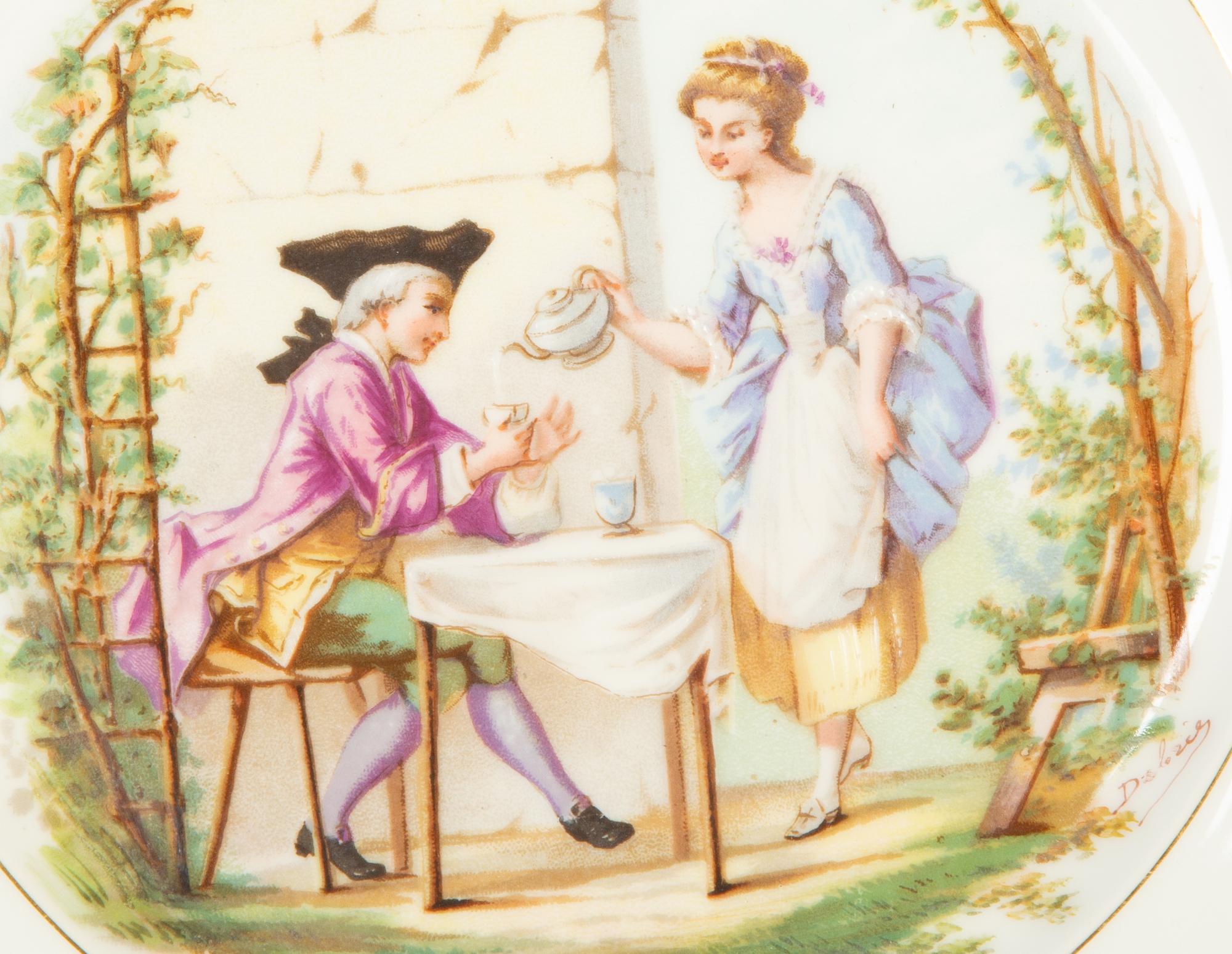 Twelve Sèvres Gilt Decorated Porcelain Dinner Plates