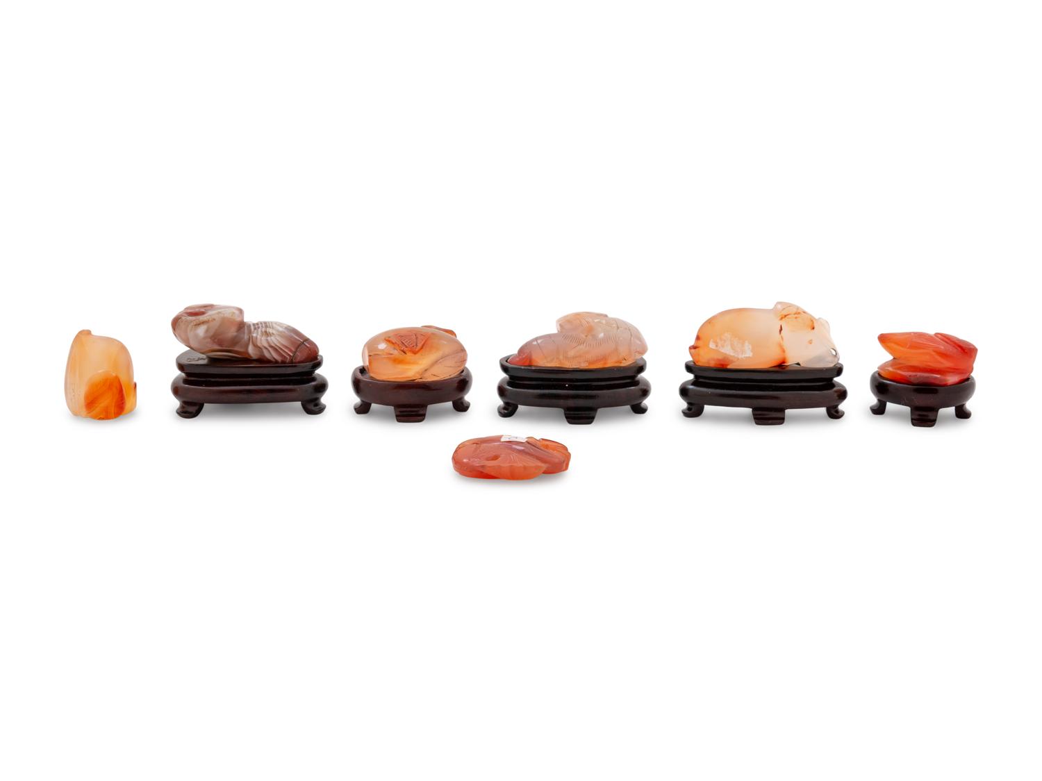 Seventeen Small Chinese Carnelian Agate Carvings