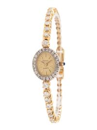 GENEVE, 14K YELLOW GOLD AND DIAMOND WATCH