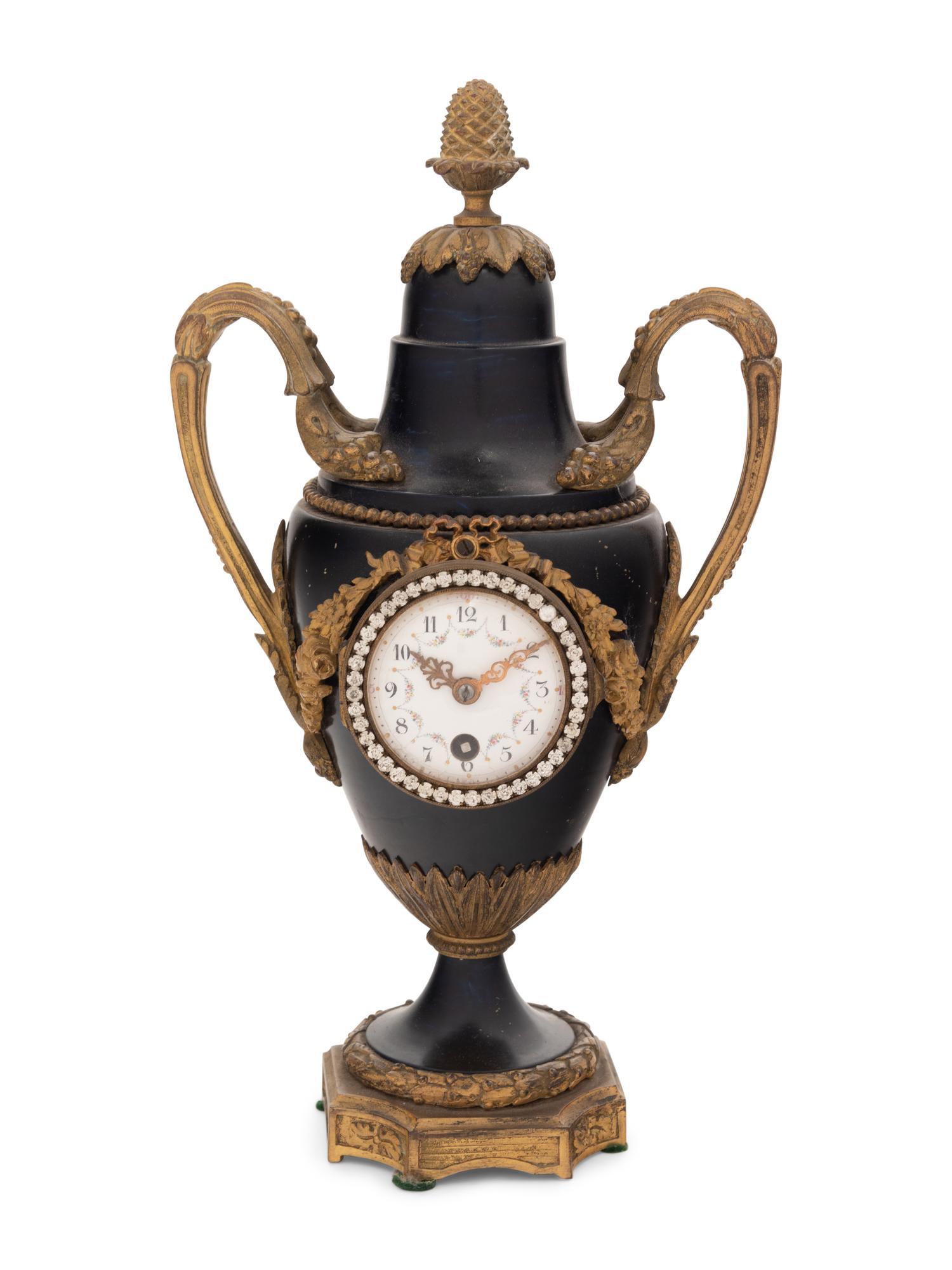 A French Gilt Bronze and Painted Tôle Clock