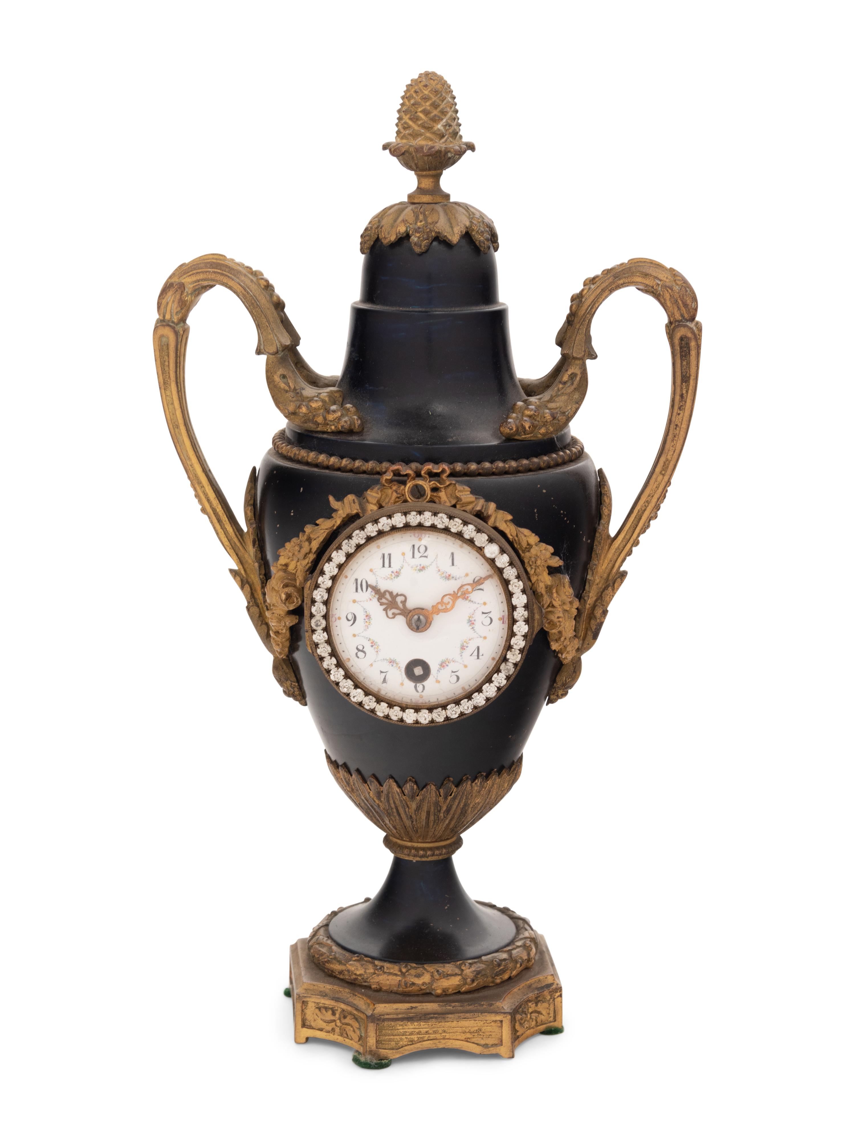 A French Gilt Bronze and Painted Tôle Clock