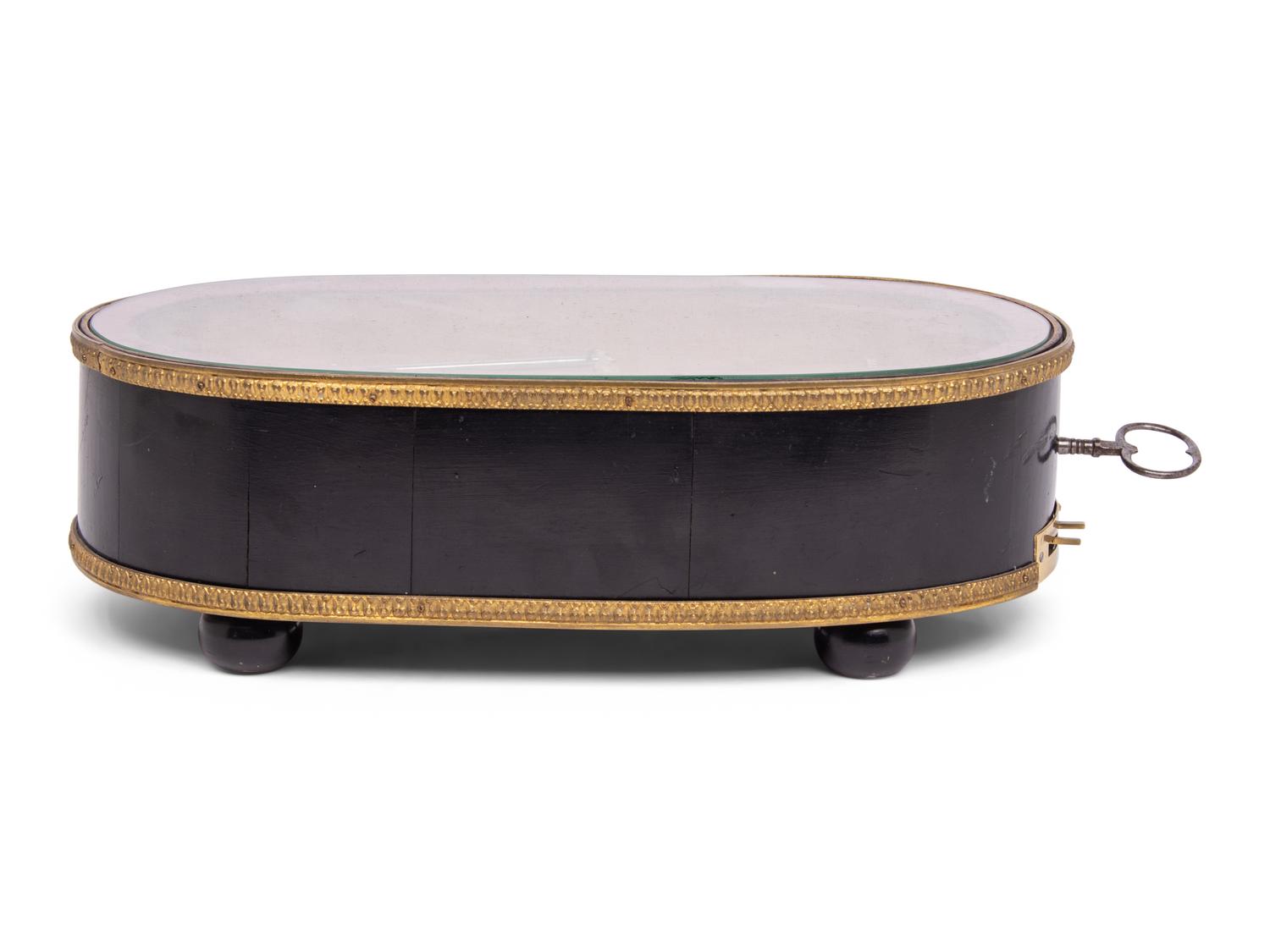 A Rare "Rigid Notation" Musical Clock Base
