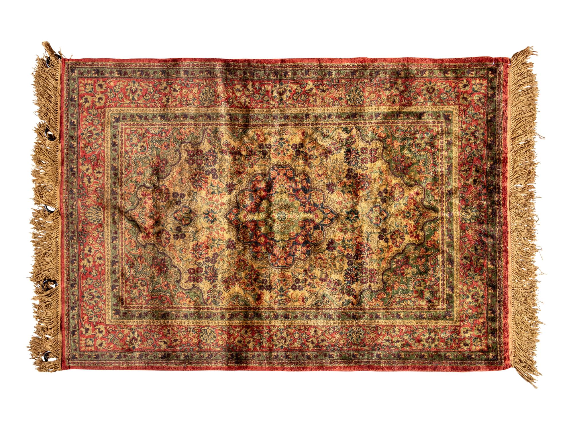 A Kashan Silk Rug