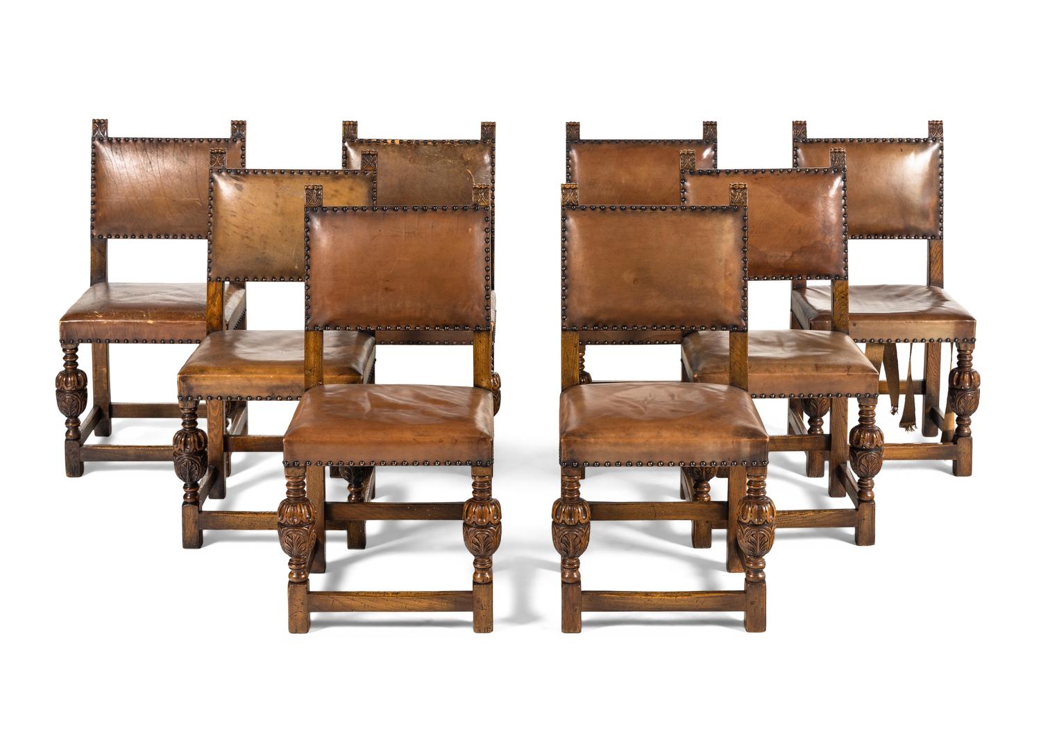 A Set of Eight Jacobean Style Oak Dining Chairs
