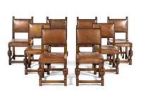 A Set of Eight Jacobean Style Oak Dining Chairs