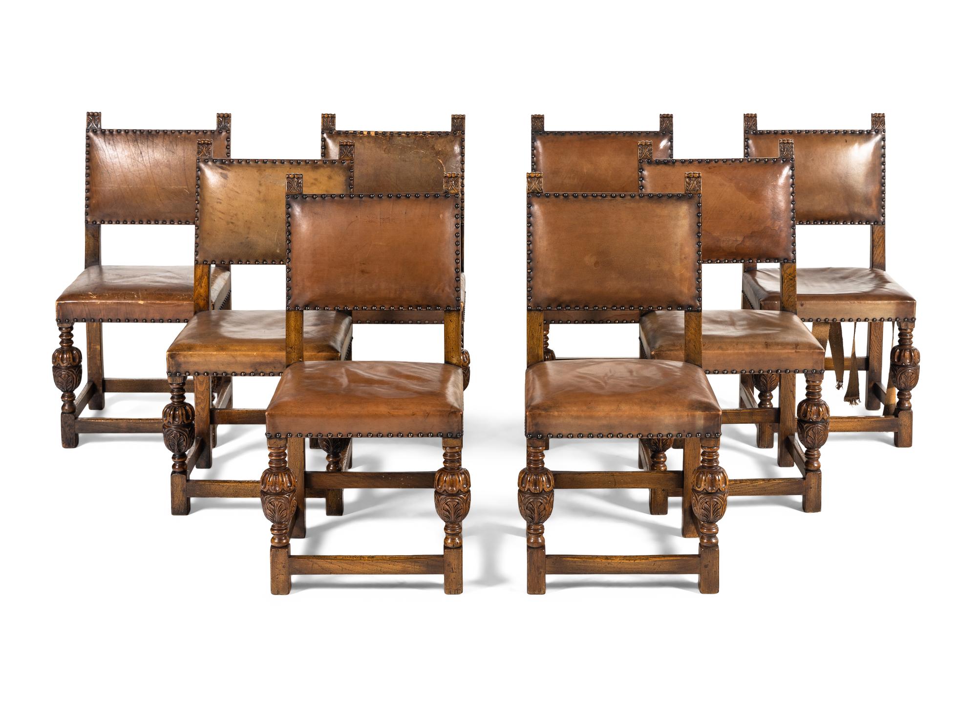 A Set of Eight Jacobean Style Oak Dining Chairs
