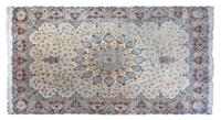 A Tabriz Wool Rug 15 feet 8 inches x 9 feet 9 1/2 inches.