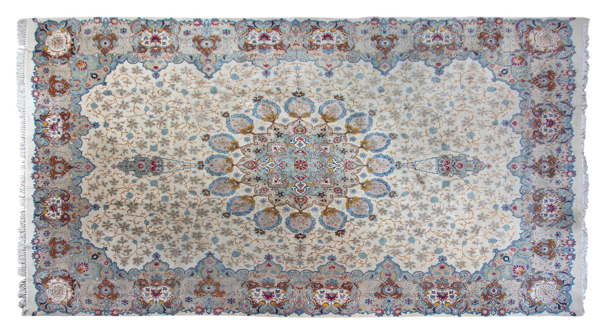 A Tabriz Wool Rug 15 feet 8 inches x 9 feet 9 1/2 inches.