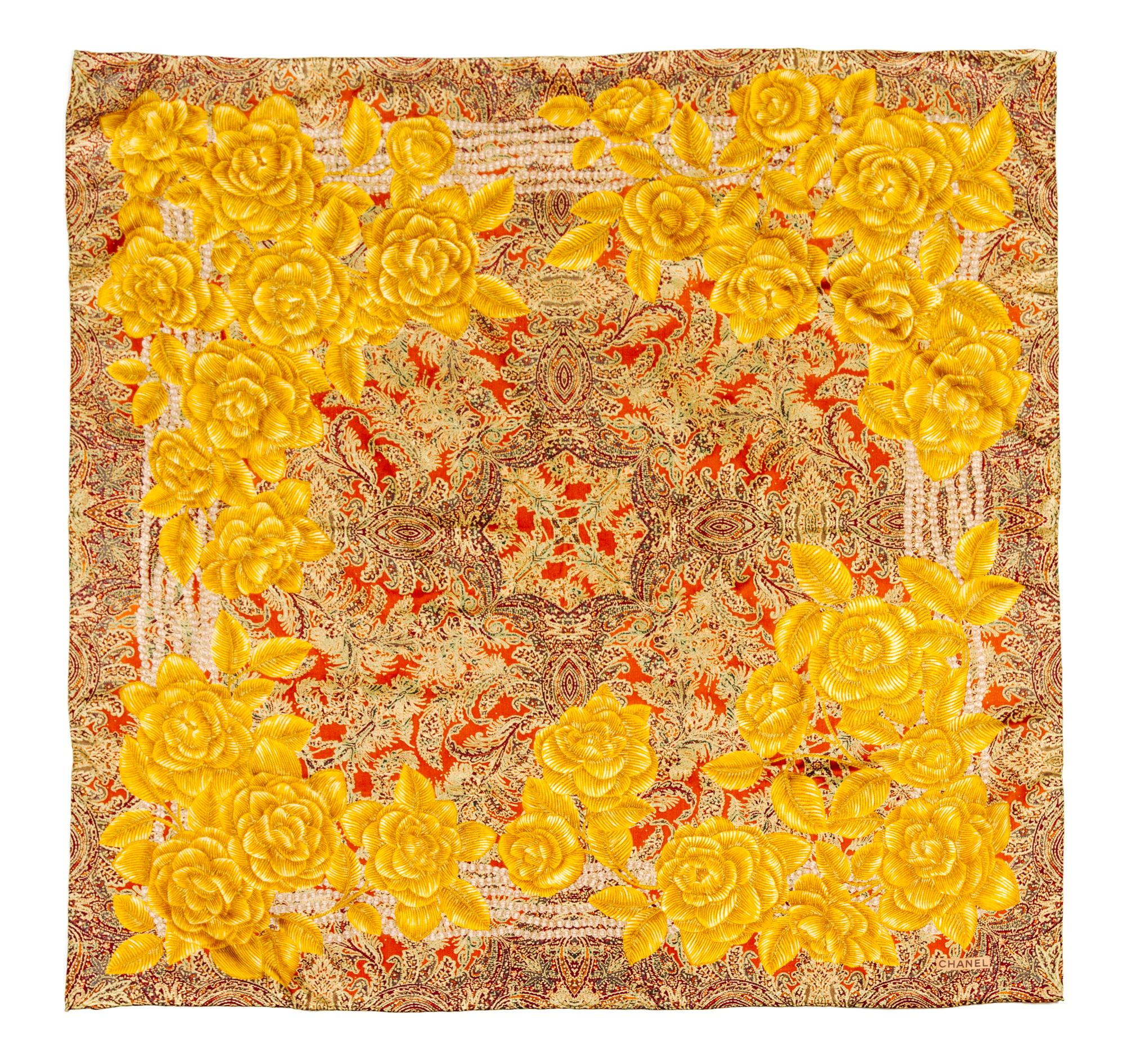 A Chanel Gold Silk Scarf, 34 x 34 inches.