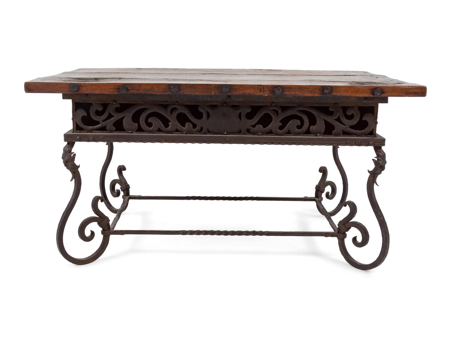 A Spanish Baroque Style Iron and Walnut Low Table