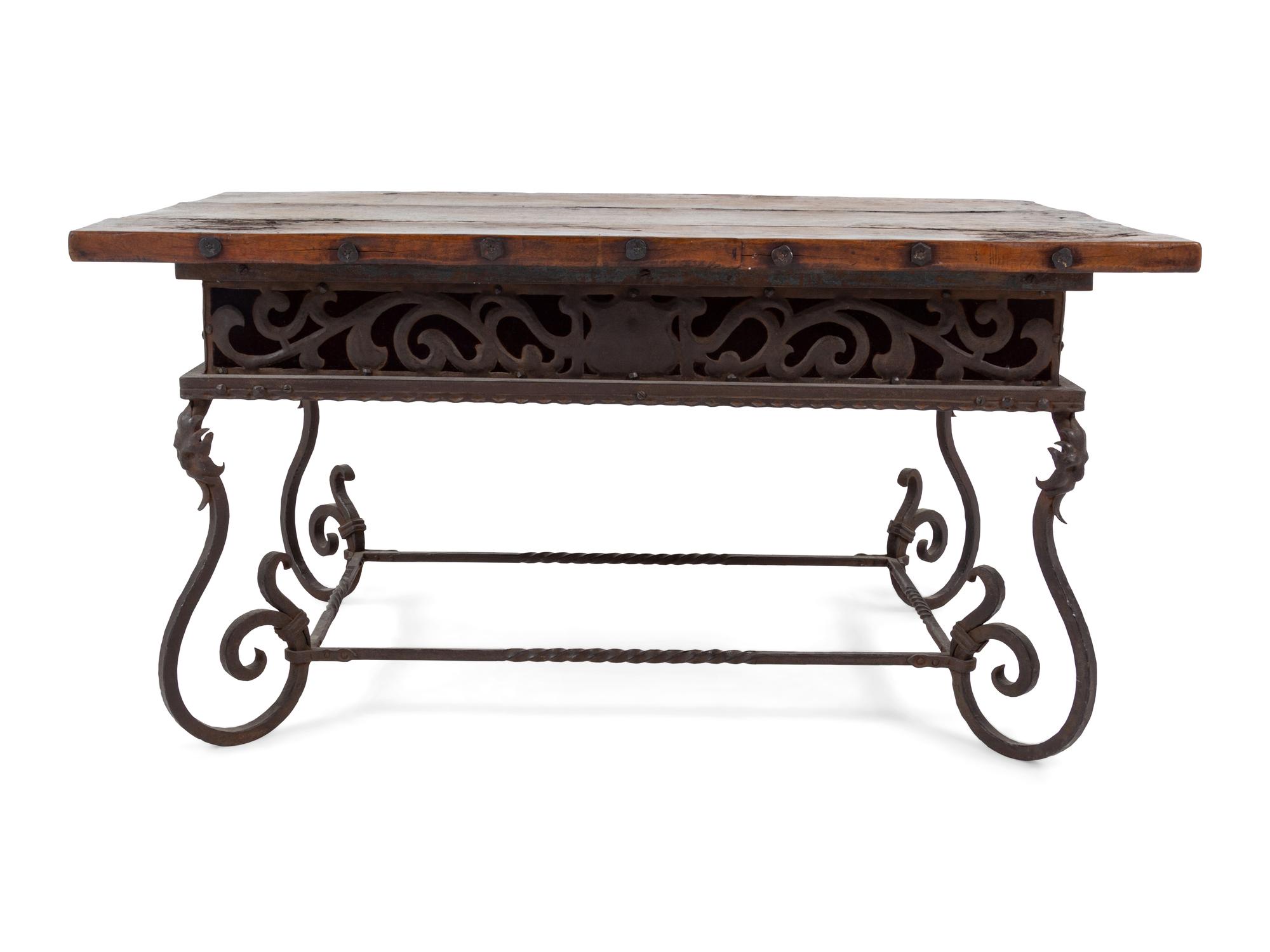 A Spanish Baroque Style Iron and Walnut Low Table