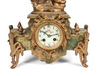 A Neoclassical Gilt Metal and Onyx Clock Garniture