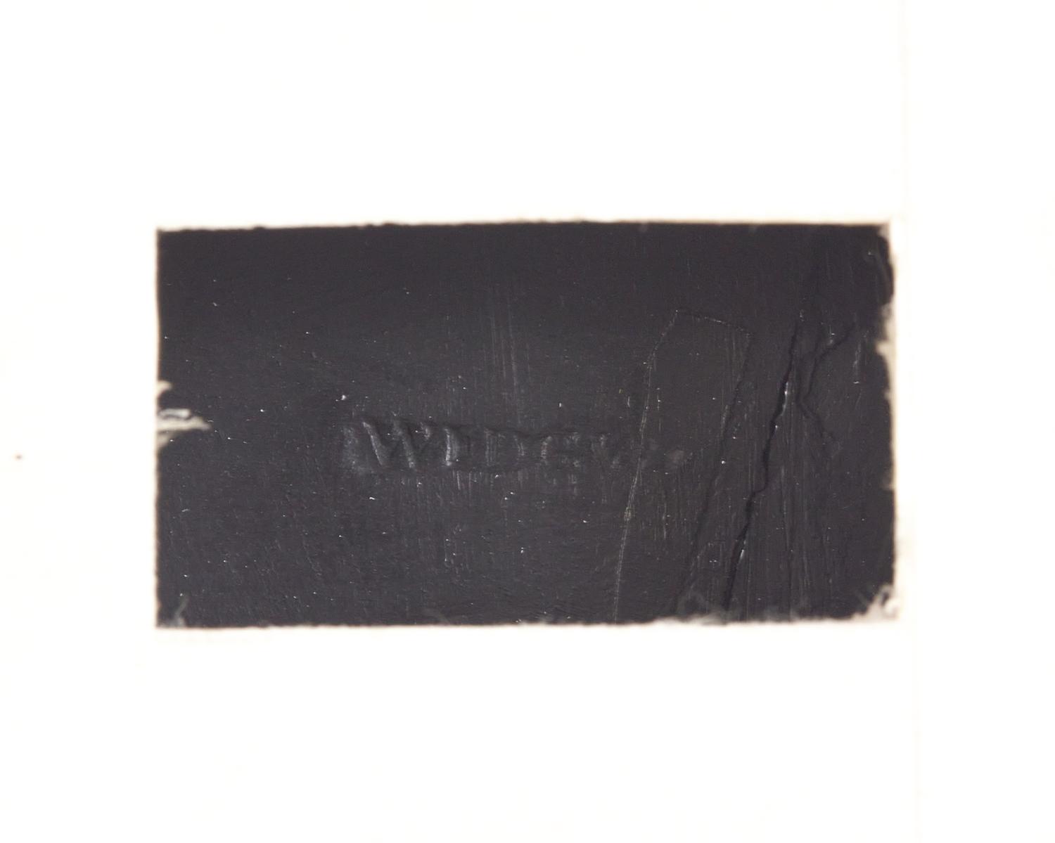 A Wedgwood Black Basalt Plaque Depicting 'Death of a Roman Warrior'