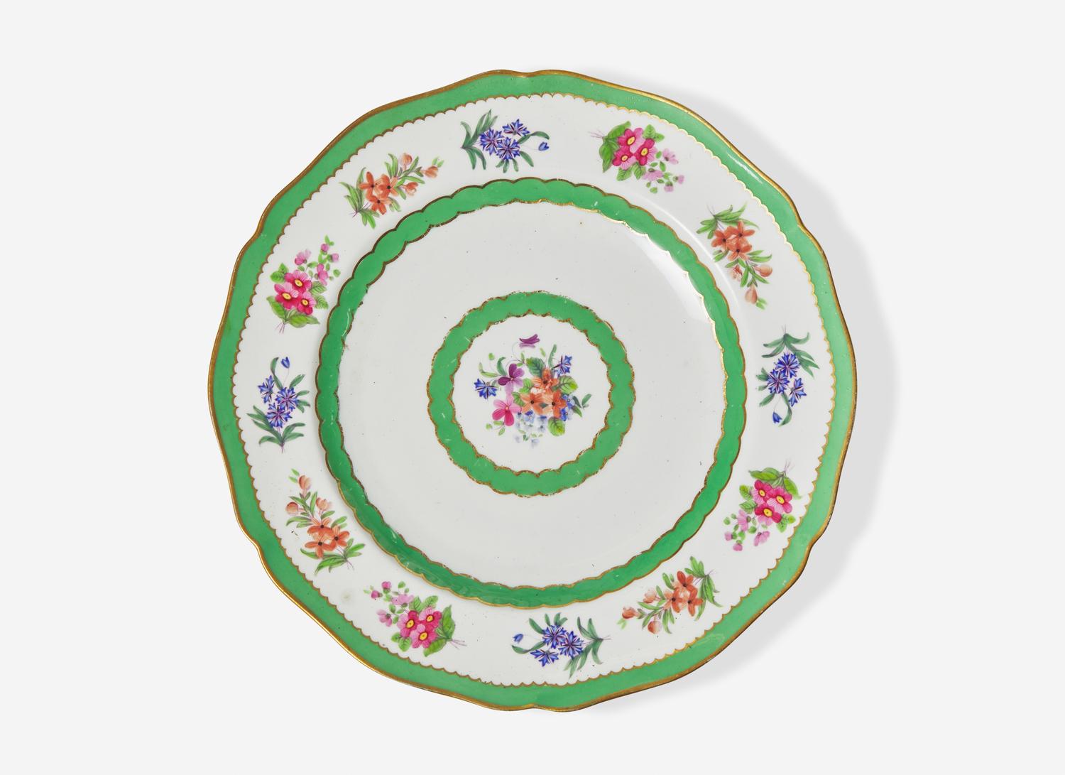 An English Floral Decorated and Parcel Gilt Creamware Dinner Service