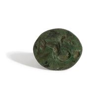 A Greek Bronze Finger Ring with Leda and the Swan or Aphrodite and her Dove