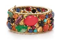 An 18 Karat Yellow Gold and Multigem Bangle Bracelet, 54.25 dwts.