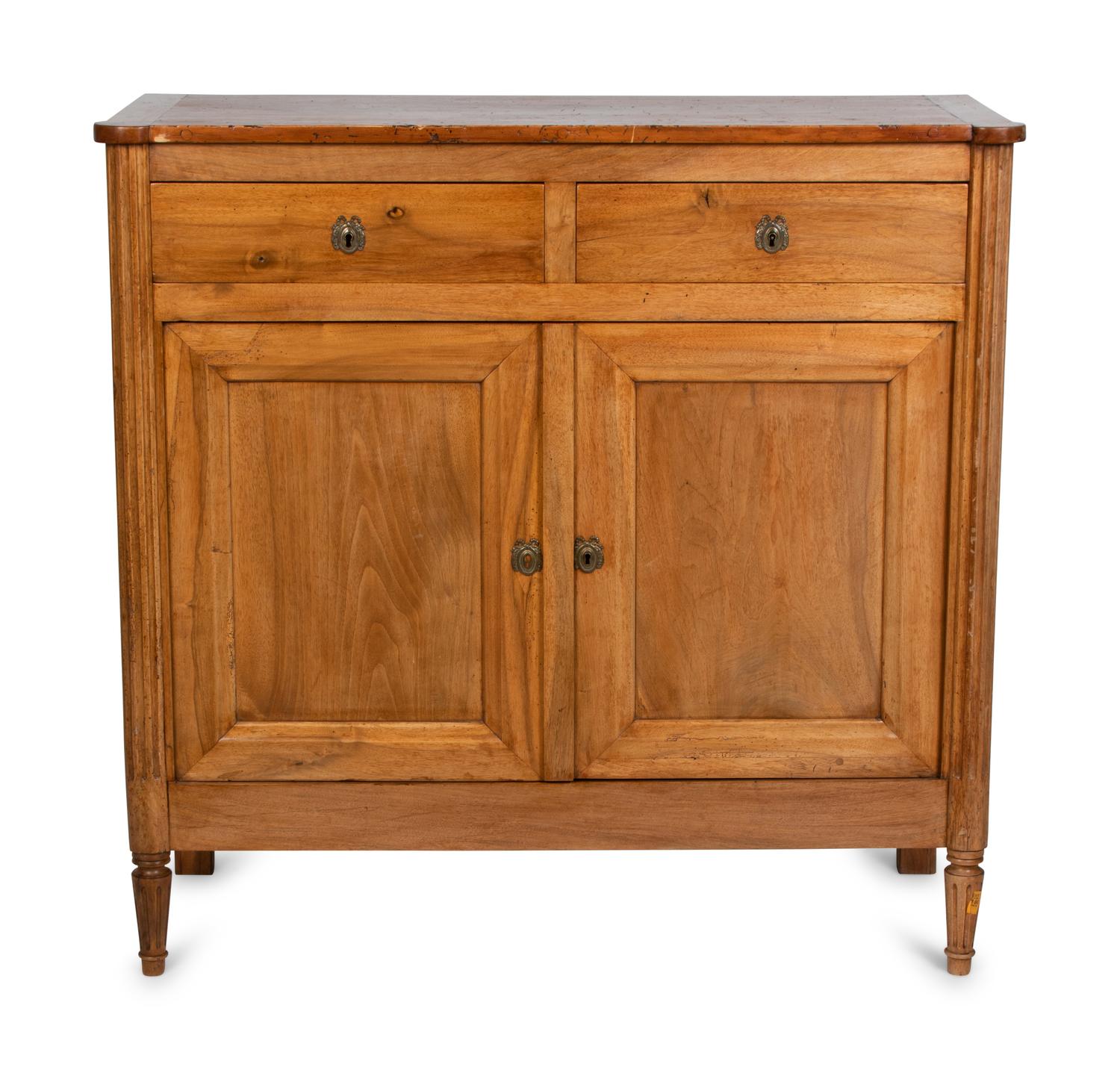 A Louis XVI Fruitwood Cabinet