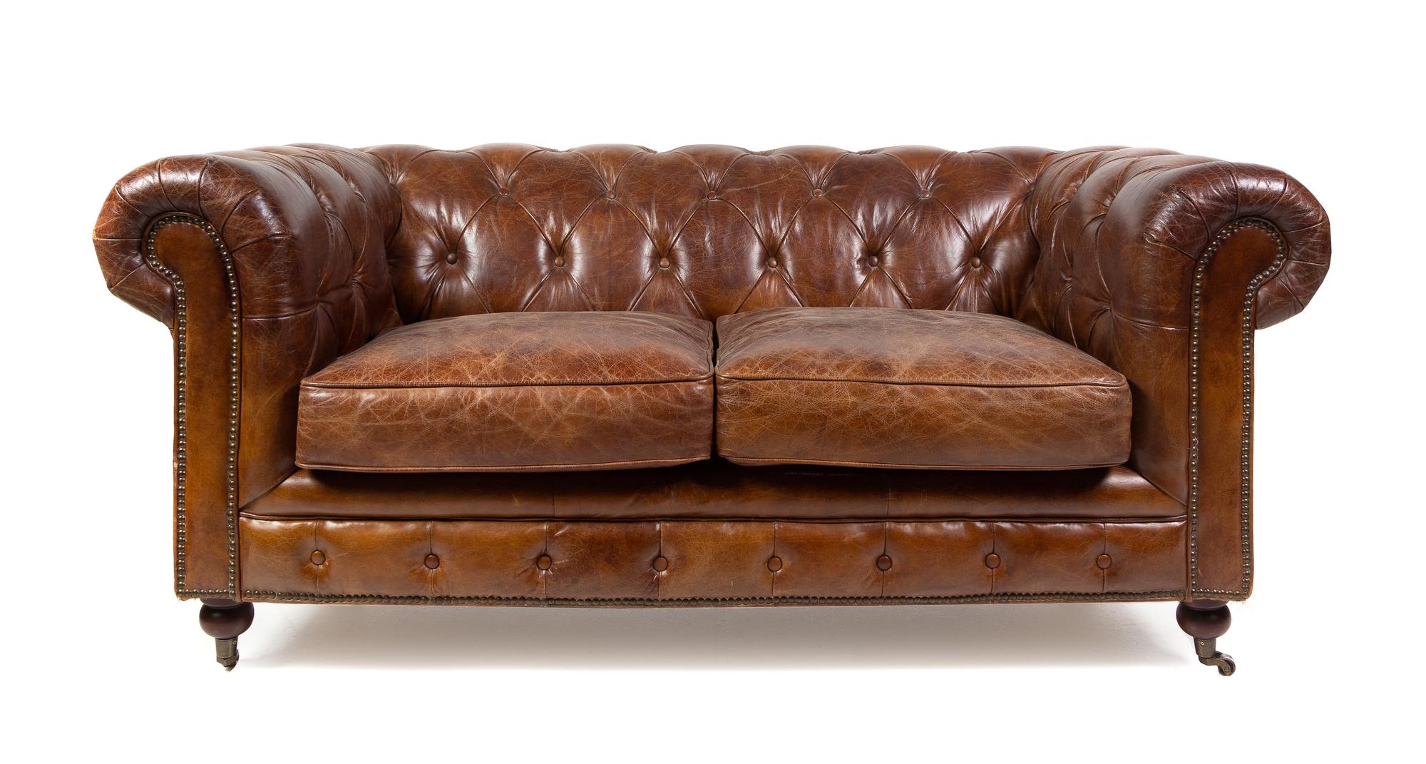 A Leather Upholstered Chesterfield Sofa