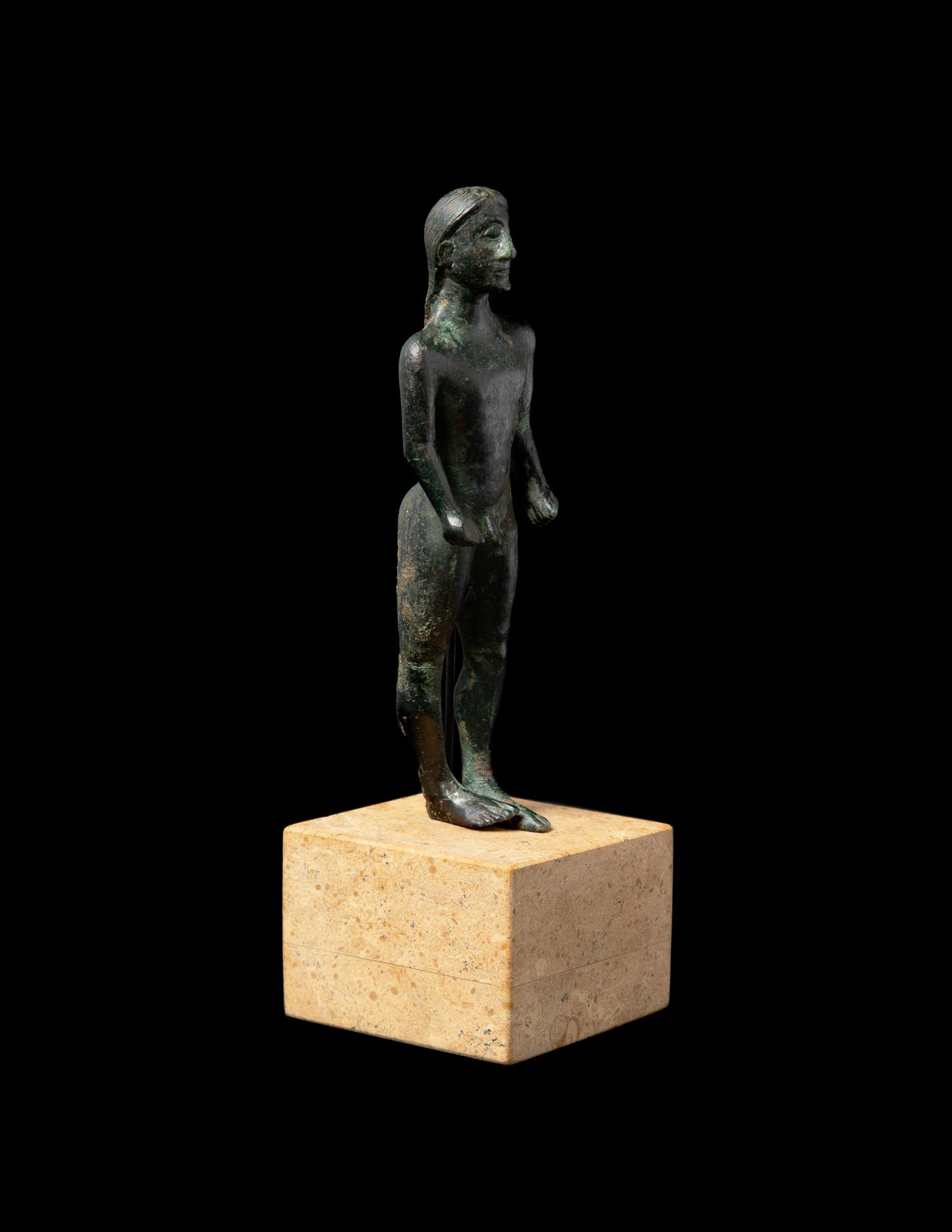 A Greek Bronze Kouros