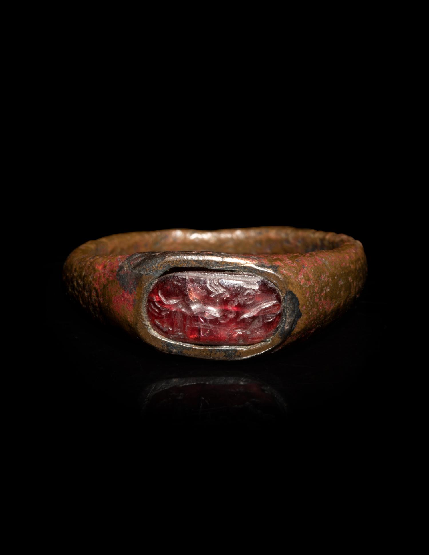 A Roman Bronze and Carnelian Finger Ring