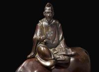 A Japanese silver-inlaid patinated bronze “Poet and Oxen” censer, Edo to Meiji period 日本嵌銀加漆高士與牛銅香爐 江戶或明治