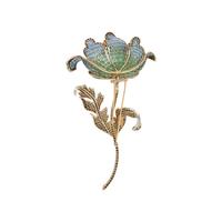 MOIRA, PLIQUE-À-JOUR ENAMEL, BLUE TOPAZ, DIAMOND, AND GOLD FLOWER BROOCH
