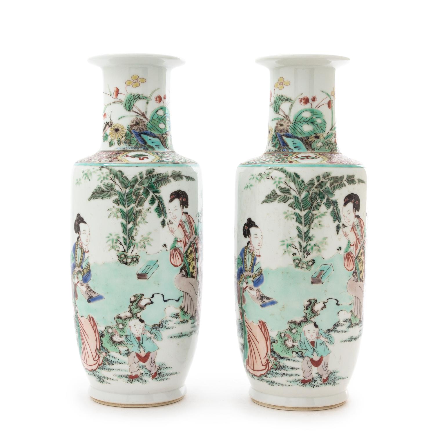A Pair of Famille Verte Rouleau Vases Height of each 11 1/8 inches.