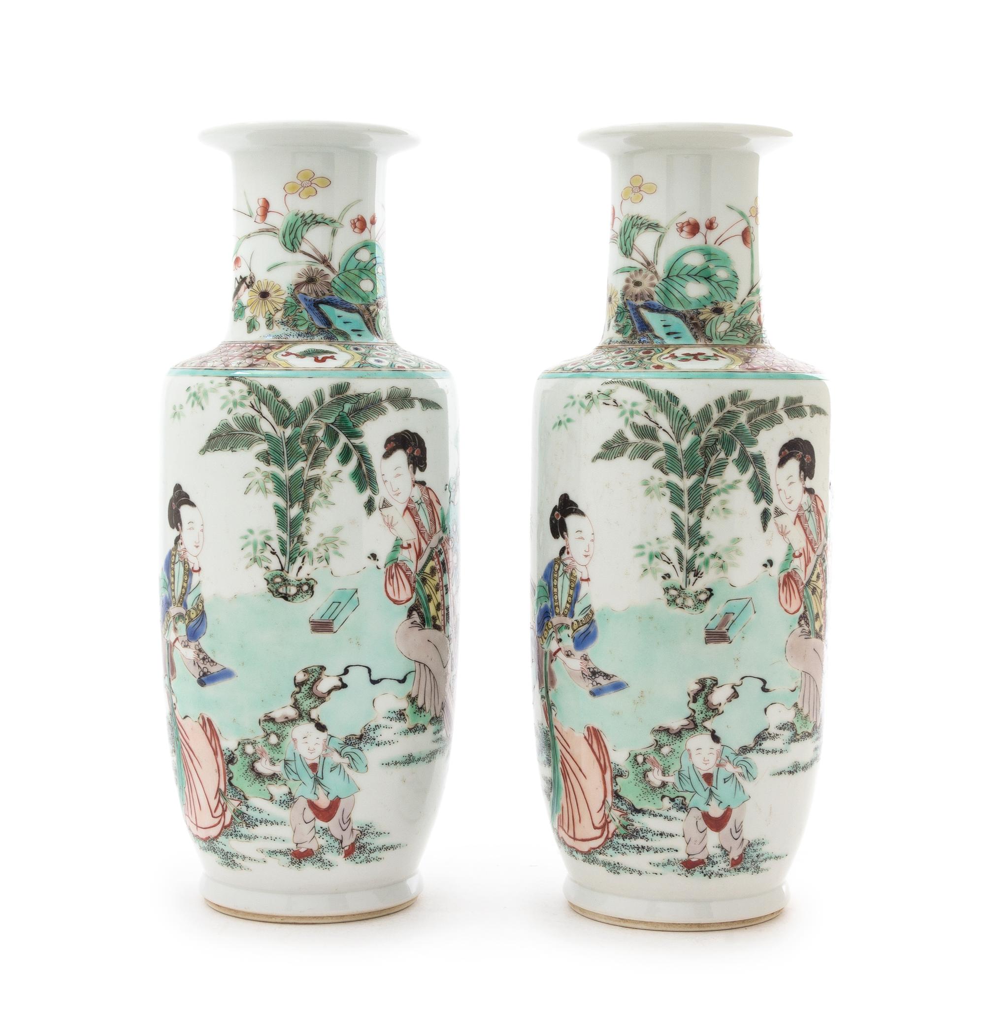 A Pair of Famille Verte Rouleau Vases Height of each 11 1/8 inches.