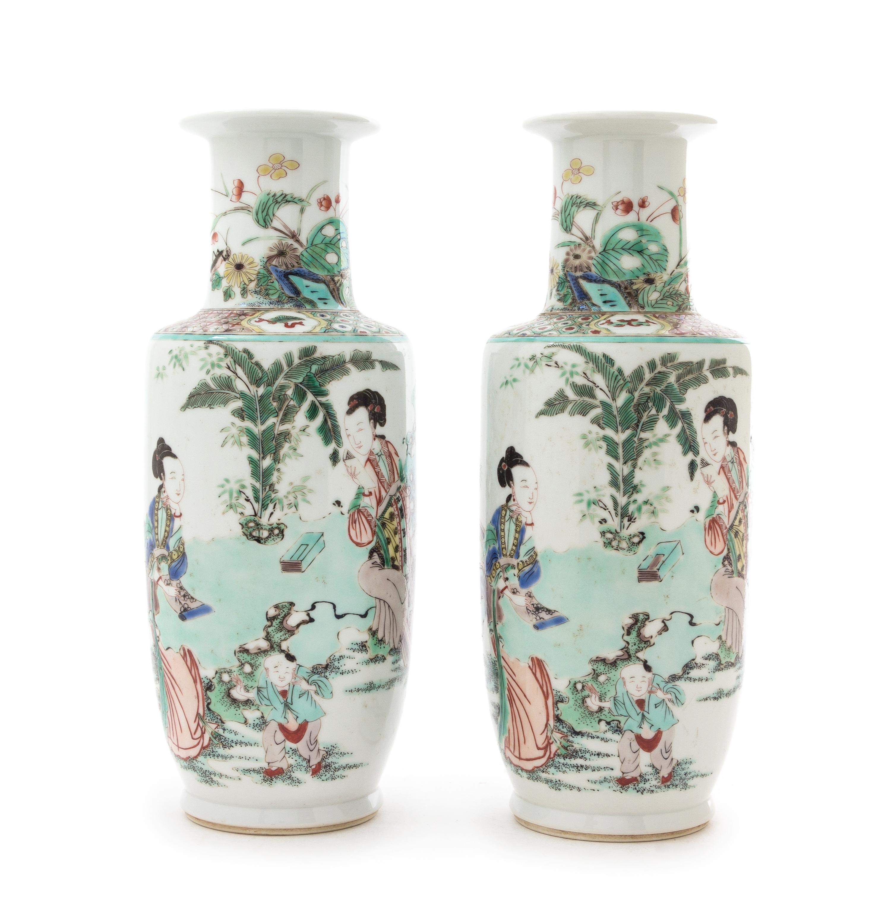 A Pair of Famille Verte Rouleau Vases Height of each 11 1/8 inches.