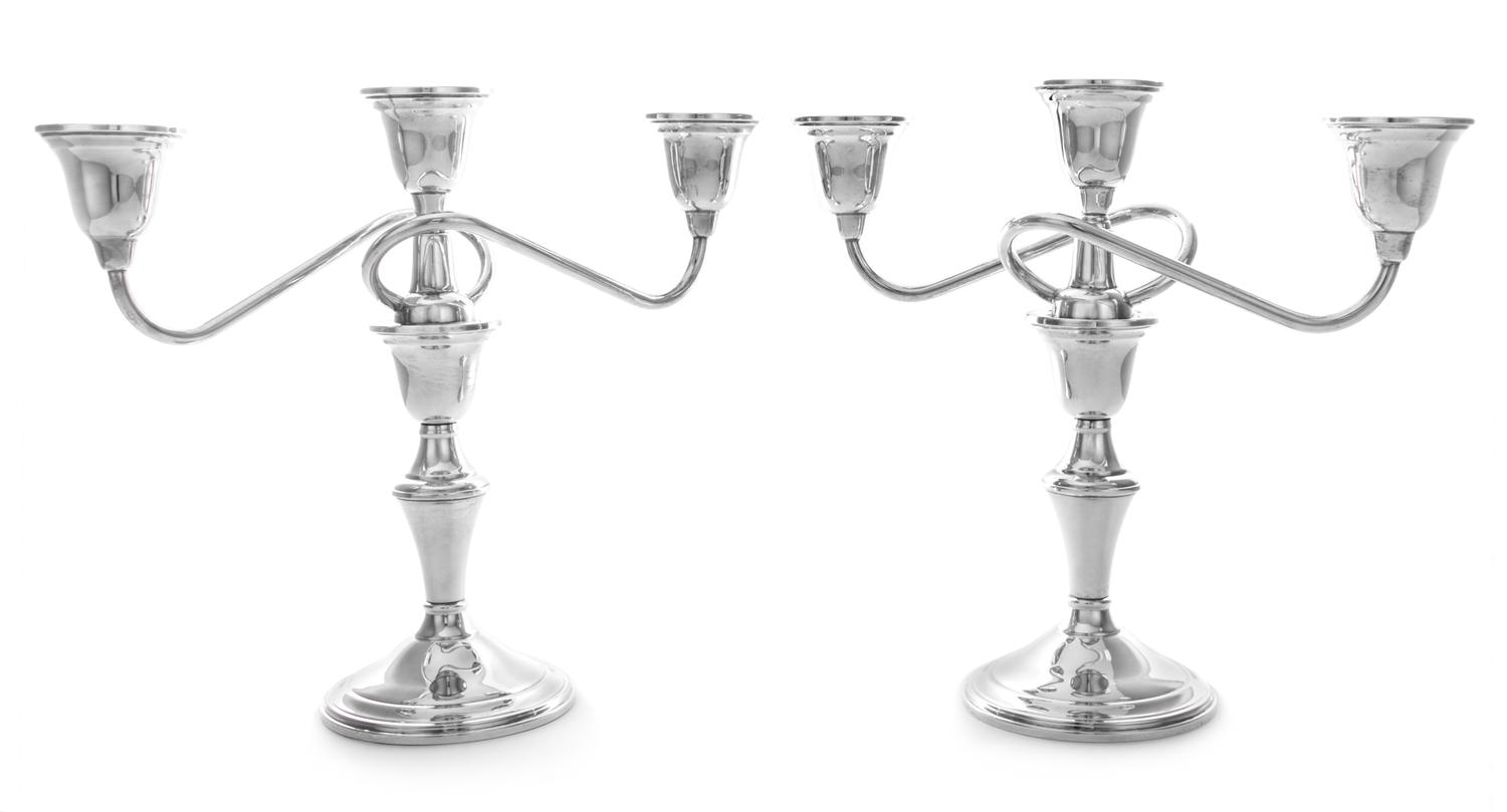 A Pair of American Silver Three-Light Candelabra, International Silver Company, Meriden, CT, having a central cup surmounting a baluste