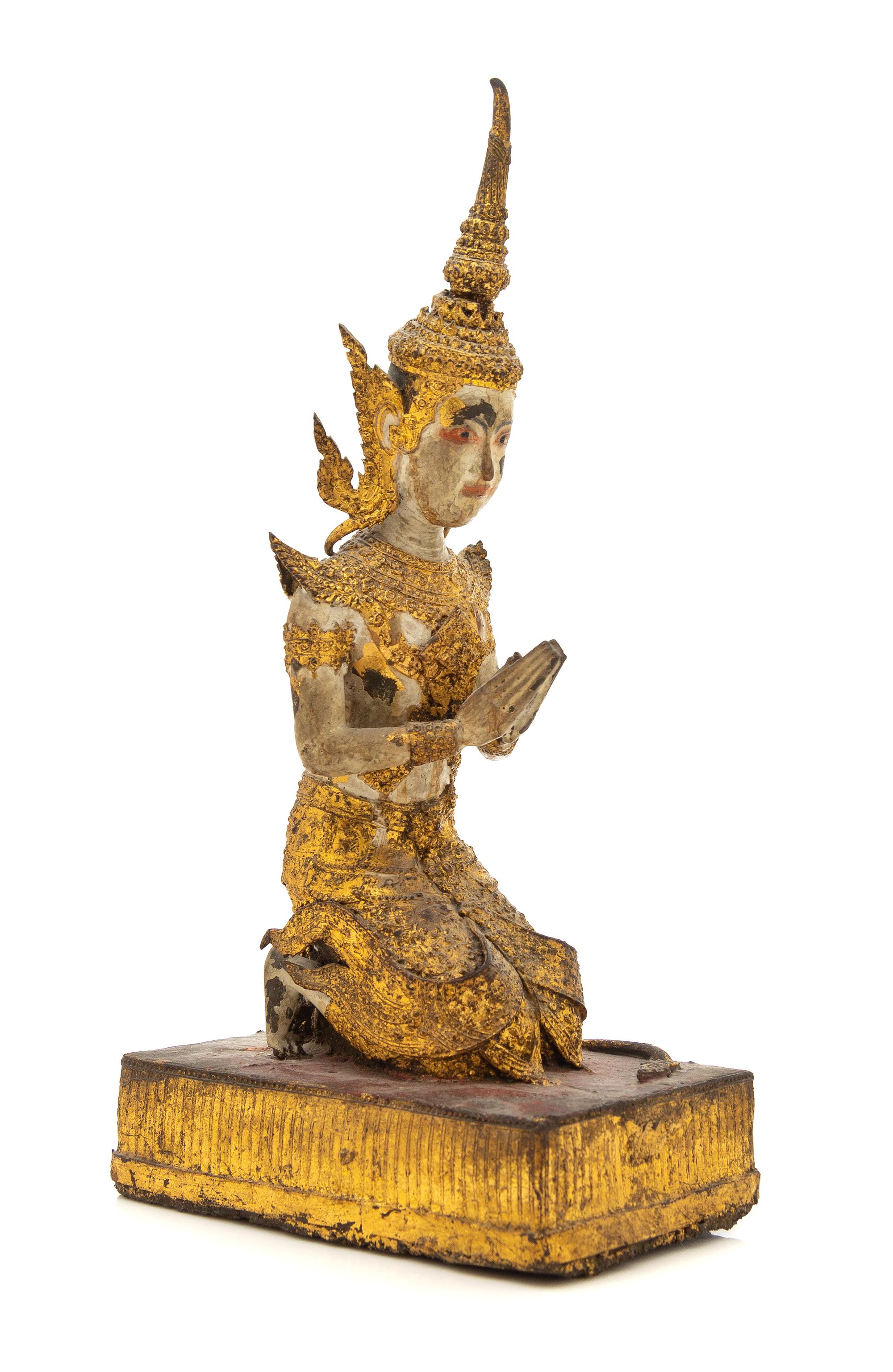 A Thai Gilt Bronze Figure of a Kneeling Deity Height 13 inches. — 19TH CENTURY