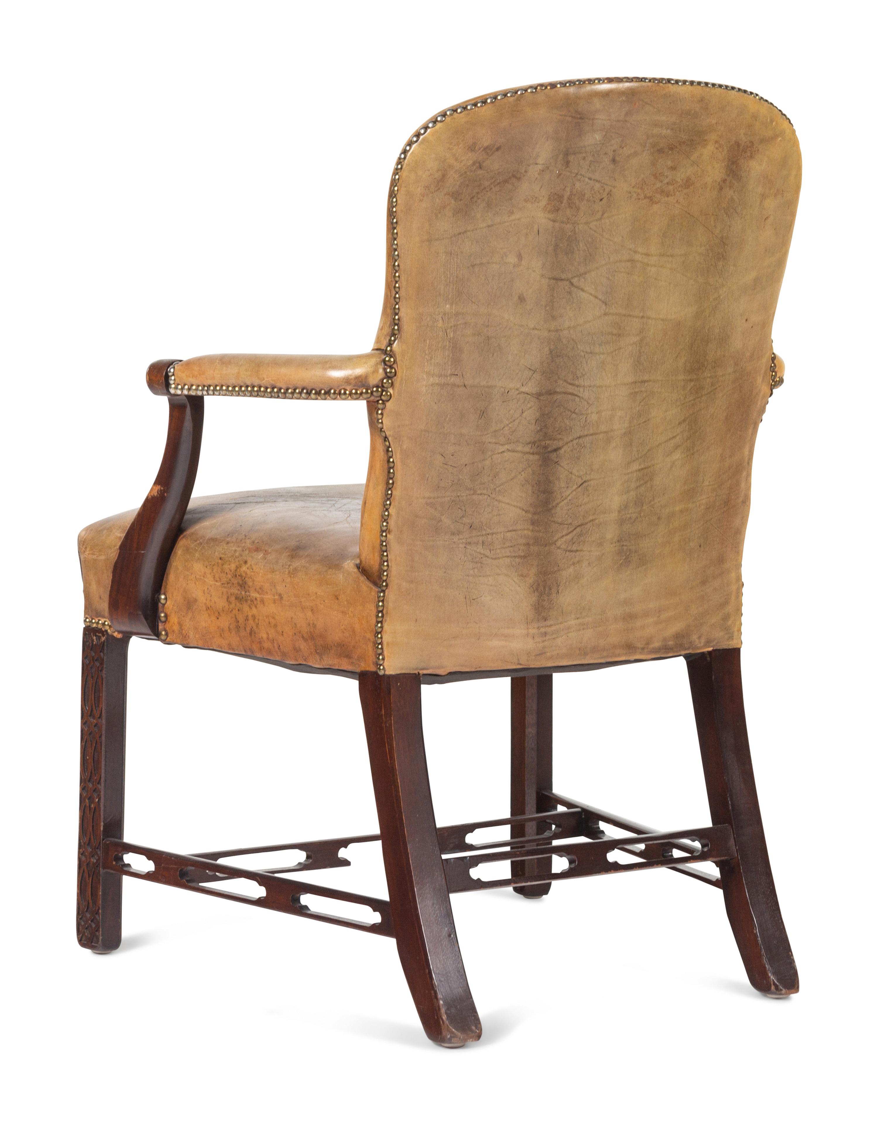 A Pair of George III Style Leather-Upholstered Mahogany Armchairs