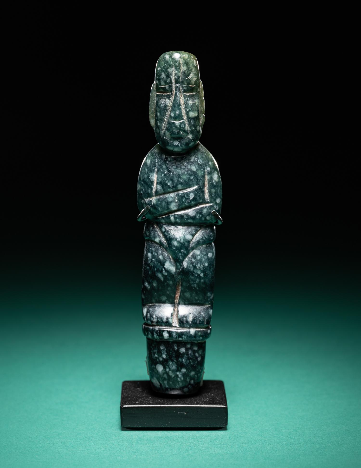 An Olmec Jade Pounding Figure