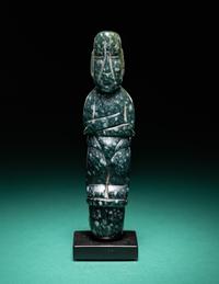 An Olmec Jade Pounding Figure